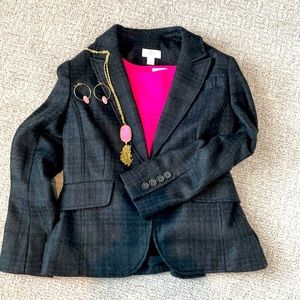 Wool blend jacket with acetate liner.